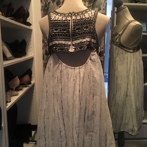 Black and white Solito sleeveless baby doll dress.